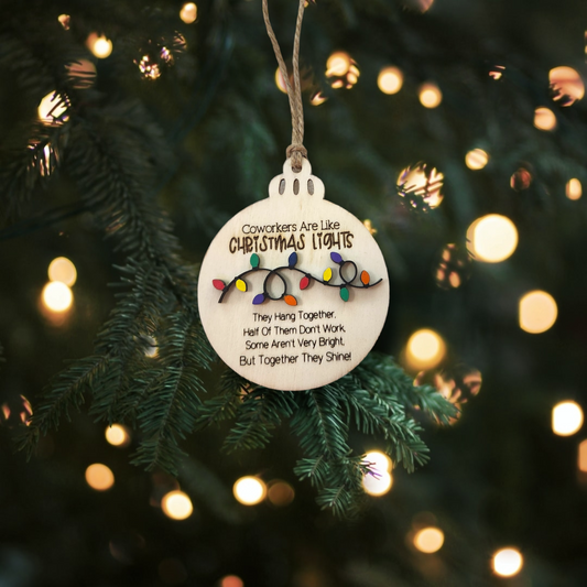 Illuminate your workspace with laughter and camaraderie with our Handmade Wooden 'Funny Co-workers are Like Christmas Lights' Ornament!