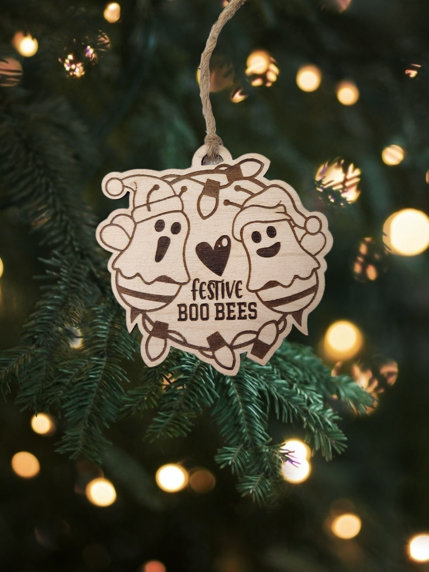 Add a buzz of laughter to your Christmas tree with our Handmade Wooden Funny Christmas 'Boo Bees' Ornament!